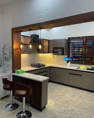 #ModularKitchen #kitchenpartition #LargeKitchen #LShapeKitchen #KitchenCabinet #WoodenKitchen #pantrydesign #inotechkitchen #RollingShutters #tendombasket #acrelickitchen