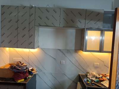 acrylic modular kitchen 
and glass profile shutter