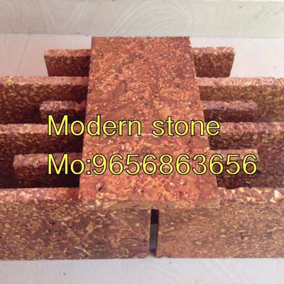 Laterite stone cladding tiles.