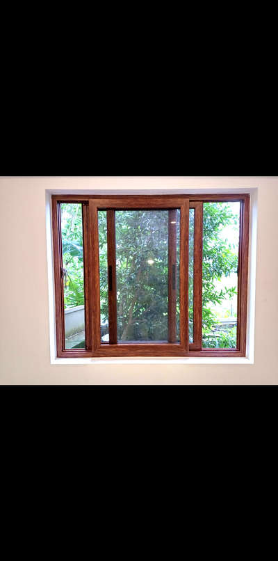 aluminium wood finish sliding windows

contact: 9074575694
