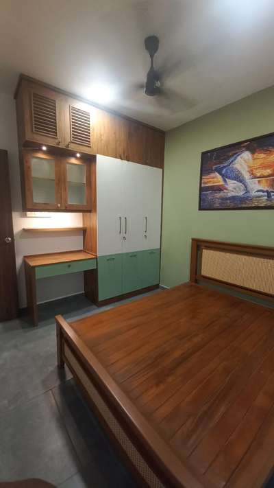 Bedroom interior for a 1 BHK flat done at Nanma One Cochin.
 #bedroom
#interior
#InteriorDesigner 
#wardrobe
#WoodenBeds 
#studytable 
#spacesaving 
#Nanma
#OneCochin
#doodlecraftdesigns 
#doodlecraft