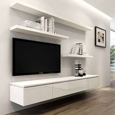 Tv unit.with high gloss white finish laminate.
#Laminate #sunmica #highgloss #finished #tvunitdesign #InteriorDesigner