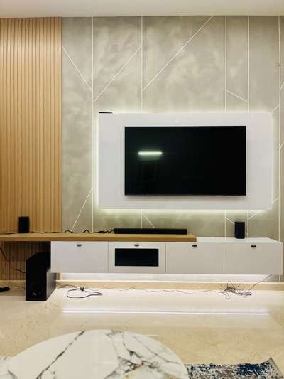 #tvunitinterior  #tvunits  #tvbackpaneling  #luvers  #LivingroomTexturePainting  #tvpaneldesign