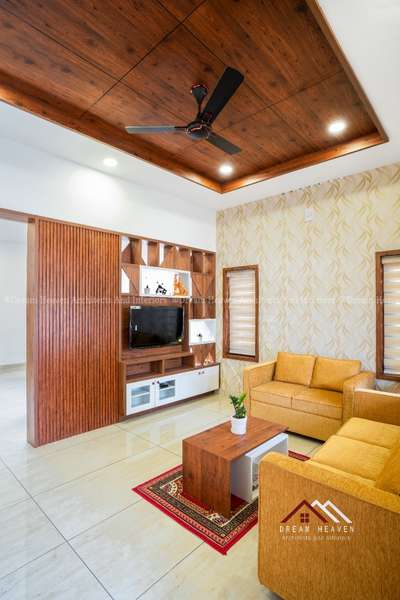 Living room design with wooden ceiling  #WoodenCeiling  #LivingRoomTV  #partitiondesign