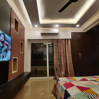 Interior design of Bed Room
#celling #tvunits #FlooringTiles #CelingLights  #BedroomDecor #mica #Designs