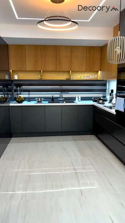 Where style meets function — this modern sleek kitchen is the heart of minimal luxury.

For interior design ideas and customized solutions, contact Decoory Interiors
.
.
#modernkitchen #sleekkitchendesign #kitcheninspiration #minimalistkitchen #contemporarykitchen #kitcheninterior #modularkitchen #kitchengoals #interiordesign #homeinspo #decoory #decooryinteriors