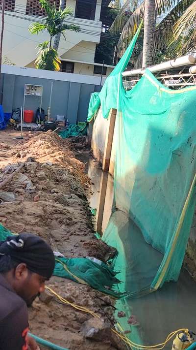 Bailing out water for Retaining wall, Chakkai