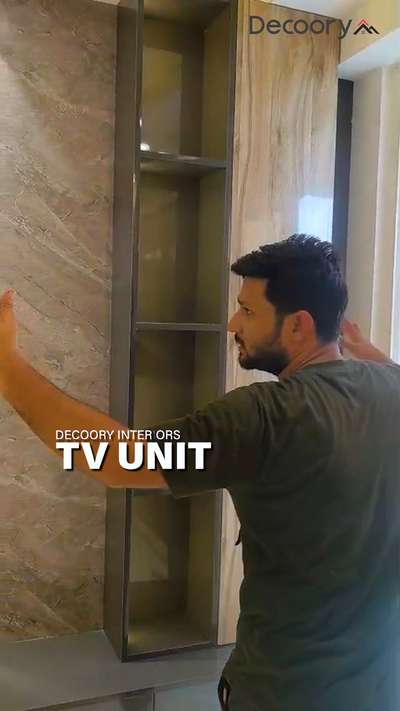 Presenting our latest TV Unit design crafted with premium marble laminate, elegant WPC louvers, smart storage cabinets, and ambient strip lights – a perfect blend of function and flair!
🔹Designed by Decoory Interiors
📍Transforming spaces with detail & style

For interior design ideas and customized solutions, contact Decoory Interiors
.
.
#tvunitdesign #marblelaminate #wpcdesign #interiordetails #moderninteriors #livingroomdesign #striplightdecor #tvwallideas #homedecorindia #decoory #decooryinteriors