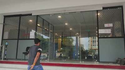 Automatic sliding glass door