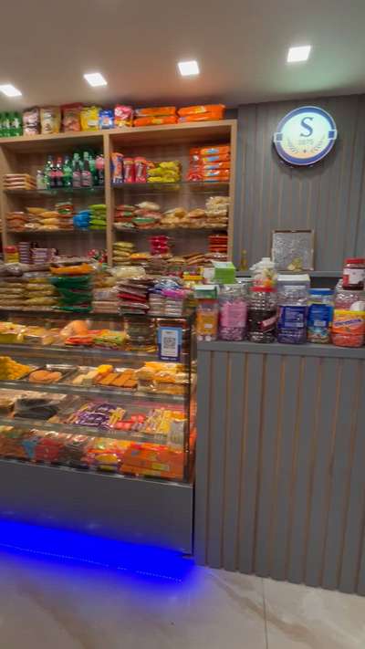 The combination of smooth textures, subtle colour contrasts, and a neat ceiling finish made the small space look more spacious and inviting. Every corner was designed to bring out a comforting and premium feel, ensuring that customers feel at home the moment they walk in.

 #bakery-interior #ineriordesign  #ineriordecor