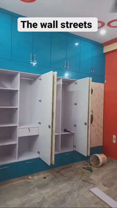 modern wardrobe blue design..(The wall streets) 
modern wardrobe in Noida and Delhi NCR