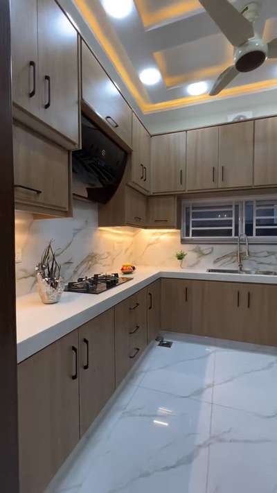 wooden laminate finish kitchen

#ModularKitchen 
#KitchenIdeas