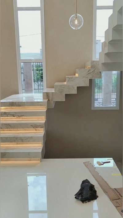 Luxurious Italian marble stairs with led done so well that you just can't take the eyes off it.
Ring us up!
#construction #constructioncompany #civilengineer #civilwork #rmc #cement #slabconcretingwork #slabcasting #wallputty #koloviral #koloapp #koloofficial #kolokitchenideas #kolotrending  #wallplaster #brickwork #concreteblock #AACblock #homepainting #painting #murals #trending #hashtag #hashtags #centring #plycentring #building #garden #landscaping #plants #Italian #italianmarbles #wallpaper #aluminumpartition #wooden #woodenwork #acp #wpc #HPL #mdf #newdesigns #creative #walltrim #louvre  #sensorlights #frenchwindows #chandelier  #tvpanel #wainscoat #attractive #cooldesign  #architecture  #interiordesign #interiordesignstudio #trendingdesigns   #bhopalcontractor   #interior_designer_in_bhopal #bhopalinteriors #bhopalfurniture #radiantstarconstruction