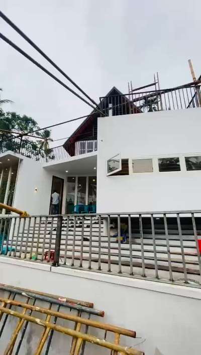 #Completedproject  #KeralaStyleHouse  #keralaarchitectures  #homedesigne  #hometheaterdesign  #SlopingRoofHouse  #InteriorDesigner  #exteriordesigns  #ModularKitchen  #StainlessSteelBalconyRailing