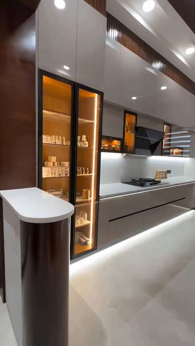 #KitchenIdeas #newkitchendesign #WoodenKitchen #KitchenRenovation #LUXURY_INTERIOR #ModularKitchen #design #LShapeKitchen #InteriorDesigner #HouseDesigns #LivingroomDesigns#Designs #noidaextension