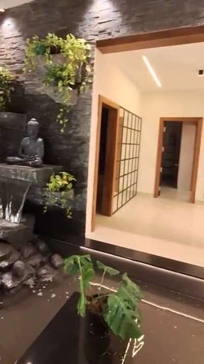 indoor water garden for a villa. #watergarden #buddhastatues #buddhasculpture #waterfountains #indoorfountain