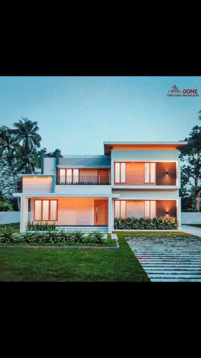 Innovation is often just the beautiful collision of two different worlds."

A 2600sqft Fusion house designed and execution by @domestructures. blends modern contemporary styles with traditional slopes.

 #modernarchitect  #KeralaStyleHouse  #modernelevation  #tropicaldesign  #fusion