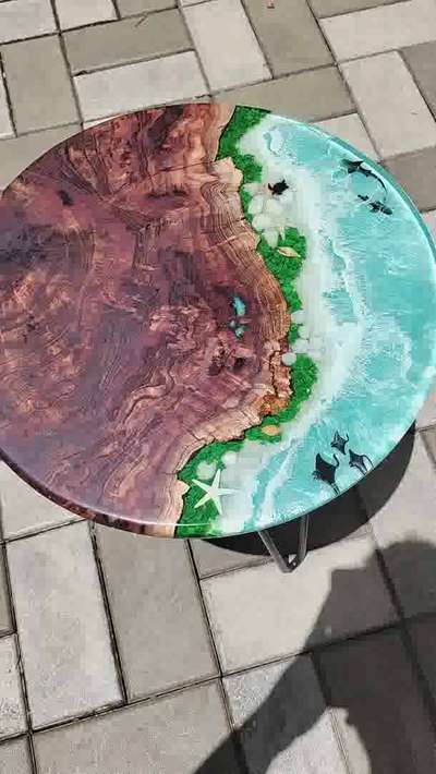 16"Ocean theme side table using rare burl wood(limited quantity available) 
Rate - Rs.9200+transportation. if interested contact on 8113852263 #resintable  #epoxy  #epoxyresintable  #epoxycoating  #epoxydining  #epoxyfurniture  #Homedecore  #epoxytablekerala  #clocks  #InteriorDesigner  #epoxytables  #resintable  #resinart  #teakwood  #TeakWoodDoors  #Teapoys  #CoffeeTable  #teak_wood  #teakwoodchair  #eastindiawalnut  #ocean  #oceandecor #sidetables  #epoxysidetable