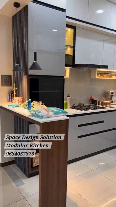 #luxuryinterior  #modularkitchen   #breakfast Counter  #Space design solution.