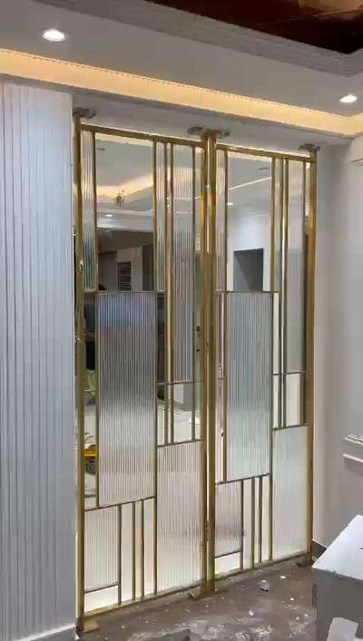 SS modular Partitions with ribbed glass. 
Gold Pvd finish gives a premium lavish look #partitiondesign #sspartition  #fixpartition #pvdpartitionpanel #partitionideas