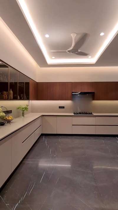 #KitchenIdeas #LShapeKitchen #lshapekitchendesign #Designs #indiankitchendesign #profile #lights #exterior_Work #Architectural&Interior #kirchendesign #cabinetry #WoodenKitchen #Carpenter #LivingroomDesigns #LargeKitchen #interastudioLuxury #luxuryaloreinterior #homeinterior #sweethome #amazingarchitecture .