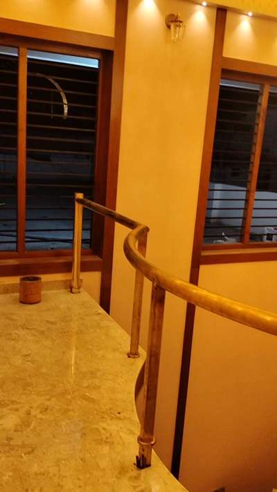 Brass spiral handrail  #handrails  #StainlessSteelBalconyRailing  #GlassBalconyRailing  #GlassHandRailStaircase