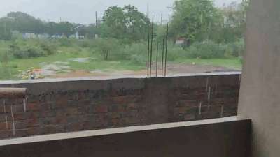 A great Rain Shower in our Amarnath Avenue Ujjain construction site. 
 #HouseConstruction 
 #ojman  #HouseDesigns  #banglow