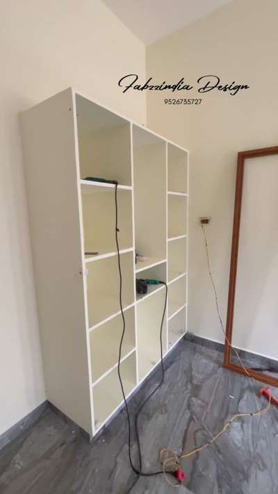 Wardrobe- border wood finish & white doors combo  😍
 #WardrobeIdeas  #WardrobeDesigns  #4DoorWardrobe  #SlidingDoorWardrobe  #moderndesign  #modularwardrobe