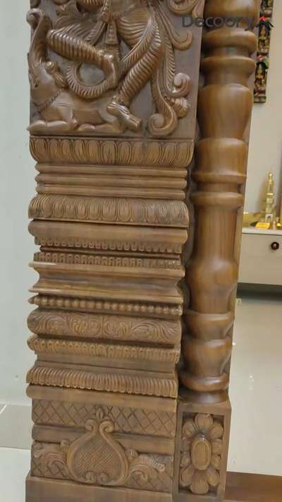 Elegance meets devotion.  A beautifully carved wooden gate designed to enhance the grace of your home mandir. Intricate craftsmanship that brings peace, tradition, and timeless beauty into your sacred space.

For interior design ideas and customized solutions, contact Decoory Interiors
.
.
#woodengate #mandirdesign #homemandir #carvingdesign #woodcarving #indiandesign #mandirdecor #spiritualspace #decoory #decooryinteriors