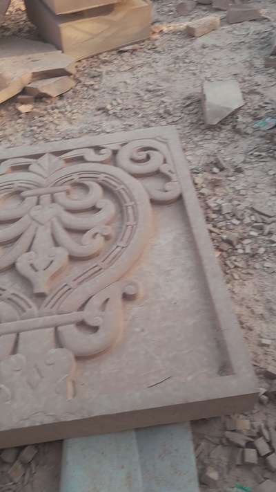 temple construction work with carving