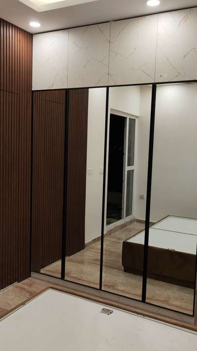 #InteriorDesigner #4DoorWardrobe #GlassDoors #WoodenBeds  #Almirah