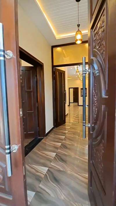 #InteriorDesigner #LivingroomDesigns #LShapeKitchen #DoubleDoor #Architectural&Interior #interiorpainting #skarchdesign