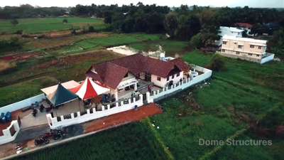 "HRIDHYAM ",residence of Mr.Bibin and Dhanya at Kannadi ,Palakkad. 
we handed them their key of hope and made their dream into reality🤩

Hridhyam:2500sqft house with slope roof using ceramic roofing tiles .The patio at the center of the house attracts everyone and makes a gathering spot for families and friends🥰🥰.
 #inaugurationday  #new_home  #Architect  #sloperoof  #4BHKHouse  #InteriorDesigner  #CivilEngineer  #Palakkad  #kajaria  #tropicalhouse