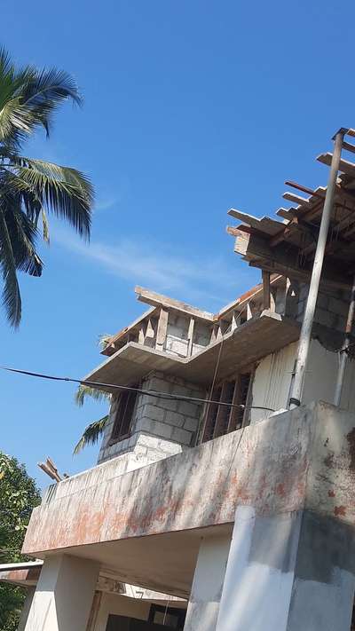 Residential building extension work , firstfloor roof concrete