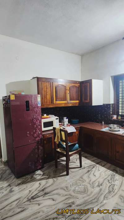 renovation project kitchen and work area acrylic finish material marine plywood 
client- john Mathew 
place - #karunagappally 
#AcrylicFinish #ModularKitchen #renovations