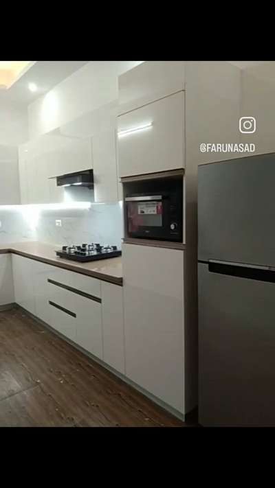 #ModularKitchen  #ClosedKitchen  #LargeKitchen  #LShapeKitchen  #KitchenCabinet  #modularwardrobe  #Modularfurniture  #modular  #Architect  #HomeAutomation  #architecturedesigns  #Architectural&Interior  #kerala_architecture  #InteriorDesigner  #KitchenInterior