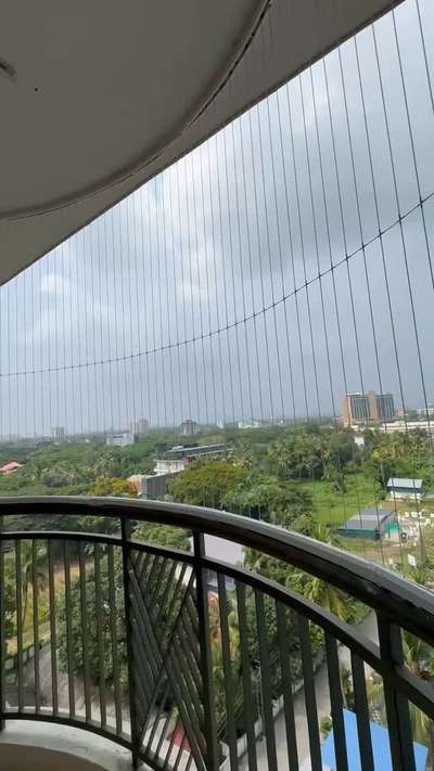 Enhancing safety without compromising views! 🌇✨ Invisible Grill Fencing installed at DD Heights, Maradu, for secure yet seamless balcony living. #QuickFence #InvisibleGrill #SafetyWithStyle