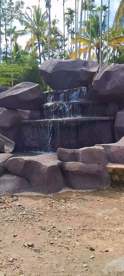 #sliding and water fountain #fountain  #rock work