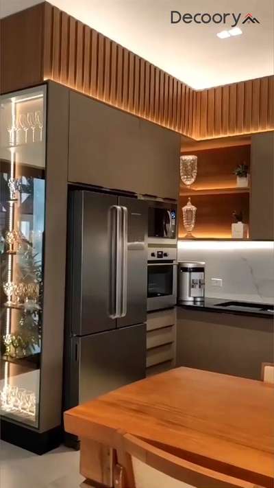 Sleek. Stylish. Smart. ✨ This modern kitchen design blends clean lines with cozy vibes – the heart of the home, reimagined.

For interior design ideas and customized solutions, contact Decoory Interiors
.
.
#modernkitchen #kitchendesign #modularkitchen #interiorideas #kitcheninspo #homedecor #kitchentrends #minimalistdesign #interiorreels #kitchengoals #decoory #decooryinteriors