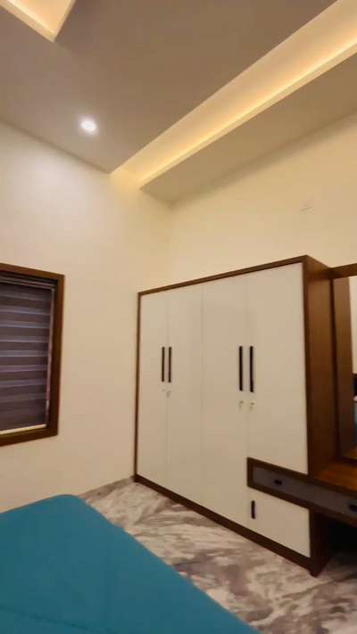 simple one 
wood &white finishing ✨
 #InteriorDesigner  #Architectural&Interior  #ZEESHAN_INTERIOR_AND_CONSTRUCTION  #interiordesignkerala