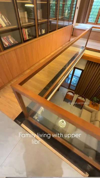 To meet the client's desire for a family living space with a double height and a library, we proposed a vertical integration of both spaces. 

By stacking the library on a mezzanine level above the living area, we created a visually appealing double-height space while maximizing functionality. 

This design not only optimized the use of the area but also added an aesthetic dimension, blending the two spaces seamlessly.

Project: Individual residence 
Site: Chelavoor, Calicut 
Area: 5400sqft
Completion year: 2025

#architecture #interiordesign #modernhome #homelibrary #decors  #familylivingroom #doubleheight #library #LivingRoomCeilingDesign