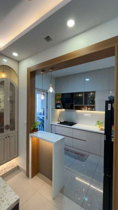 Beige, white, and grey coming together to create a kitchen that feels both warm and premium
 #iamjindesigns  #premiumkitchen  #pastelcolors