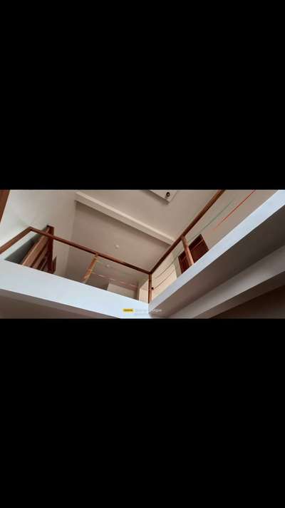 An exquisite handrail crafted from teak wood and stainless steel rope is featured at Matool Kannur