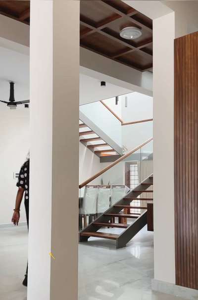 Promoting modern and minimal aesthetics  #modernminimalism #ContemporaryHouse #industrialdesign #GlassHandRailStaircase #StaircaseDecors #elegantlook #moderndesign #WoodenWindows #WoodenStaircase #MarbleFlooring