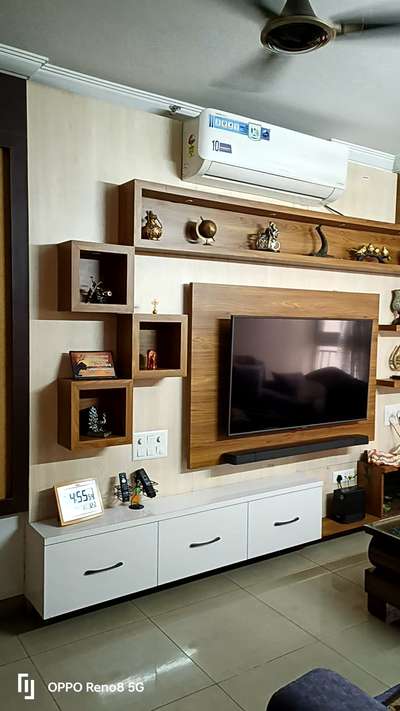 top trending living room TV unit and balcony covering and sofa set area designed by build space Associates #buildspaceassociates 
 #homerenovation 
#nearmeinteriordesigner