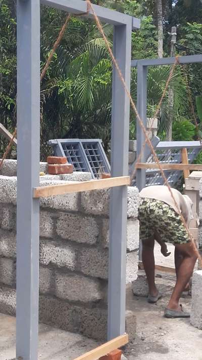 Block work , Doors & windows installation for a residential building .