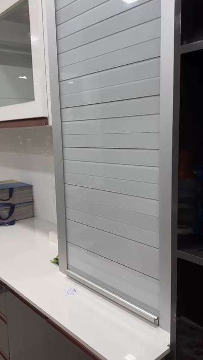 GLASS ROLLING SHUTTER