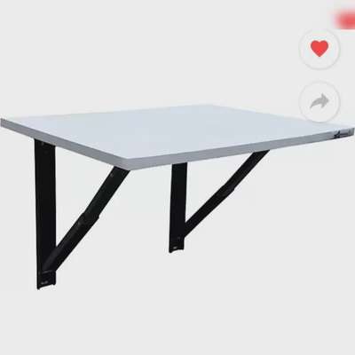 Wall mounted folding table.