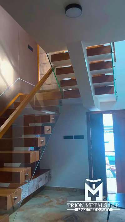 Teak wood &glass handrail #GlassHandRailStaircase  #GlassBalconyRailing  #toughenedglass  #WoodenFlooring