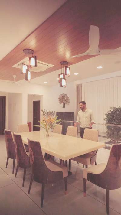 Vivacious interiors- Dining room of Varghese Panthalam #dining  #diningroom  #waterfountain